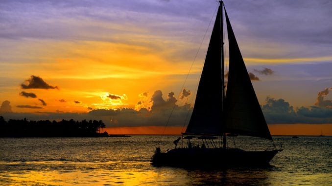 New York sailboat cruises along with a beautiful sunset in the background