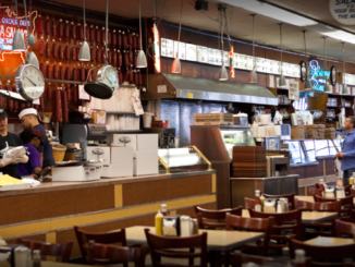 customer waits as food is prepared at Katz's Deli New York