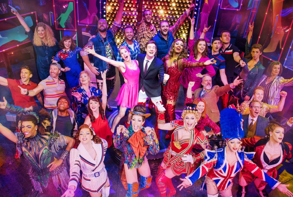 Kinky Boots London Broadway show cast posing for the audience