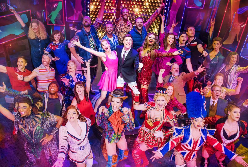 Kinky Boots London Broadway show cast posing for the audience
