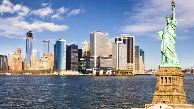 A view of New York from the Hudson River with the Statue of Liberty in the foreground