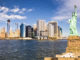 A view of New York from the Hudson River with the Statue of Liberty in the foreground