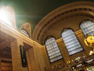 Sunlight shines through window at Grand Central Station