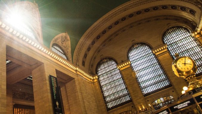 Sunlight shines through window at Grand Central Station