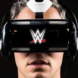 Man wearing a WWE virtual reality headset at VR World NYC.