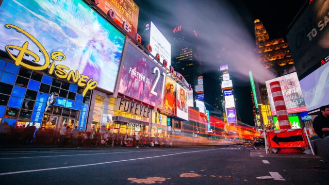 People enjoy New York City’s Times Square at night