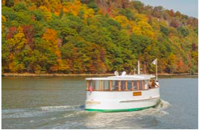 A Classic Harbor Line yacht cruising up the Hudson River on a Fall Foliage Cruise.