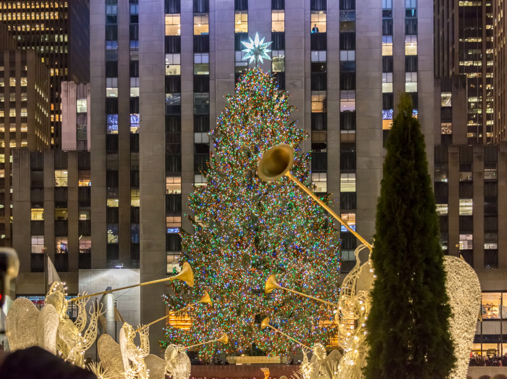 The famous rockefeller tree lit up fpr christmas - new york in december