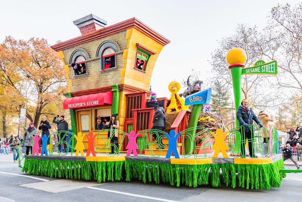 colourful fun house passes by on Macy's Thanksgiving parade