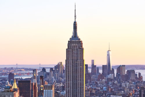 Cityscape view of Manhattan with Empire State Building, New York City, USA at sunset