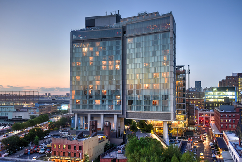 View across Manhattan Meatpacking District and Chelsea from above, at sunset with The Standard Hotel in view.