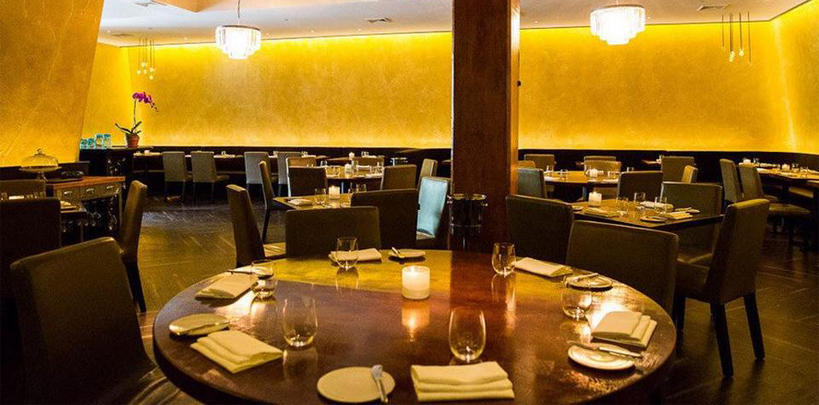 table set Inside Bâtard Restaurant New York