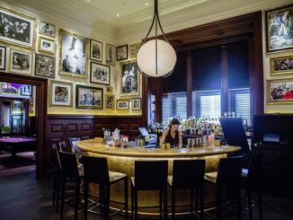 bar tender ready to prepare drinks for punters Inside the Clocktower New York City