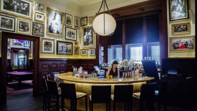 bar tender ready to prepare drinks for punters Inside the Clocktower New York City