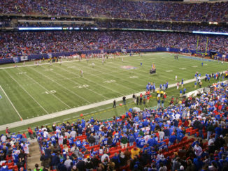 A pitch side view of New York Sports team the Giants playing a home game at the Metlife Stadium