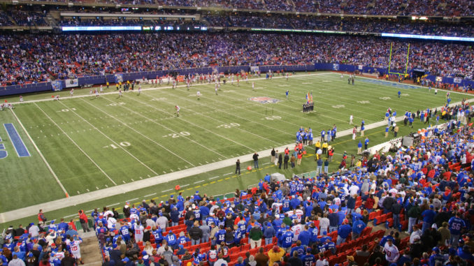 A pitch side view of New York Sports team the Giants playing a home game at the Metlife Stadium