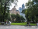 cyclists riding through the beautiful central park - central park bike rental