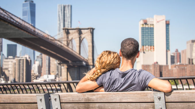 loved-up couple enjoying the view of NYC - most-romantic hotels in new york