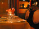 candle lit table ready for diners to arrive at one of the most romantic restaurants in new york