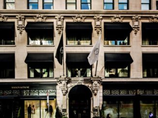 Front of the NoMah Hotel New York with flags blowing in the wind