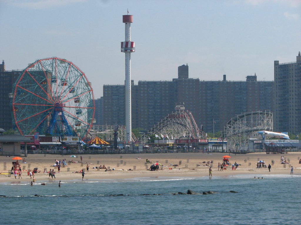 coney island beach with the fun fair in the background