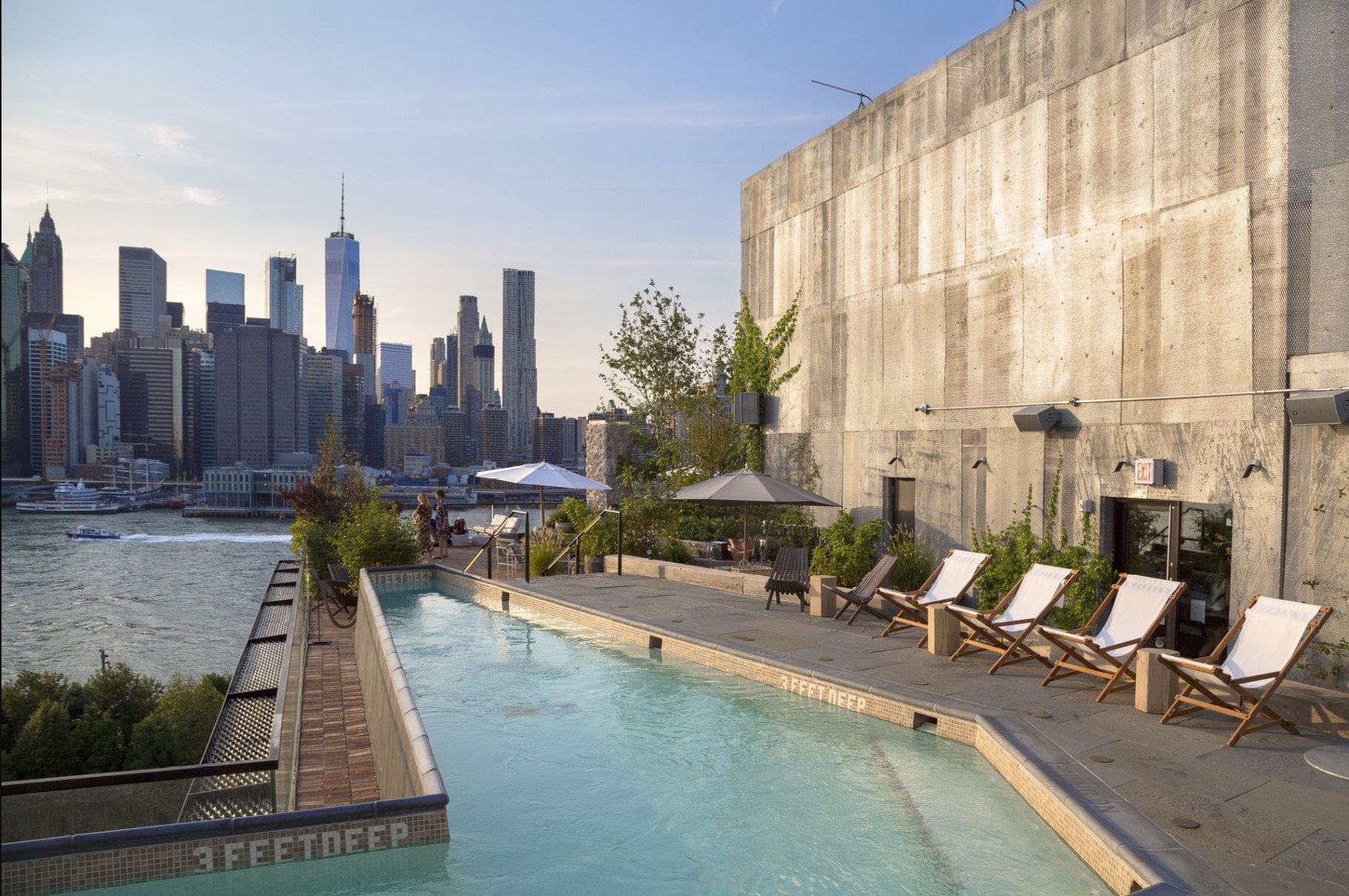 Rooftop pool with Manhattan skyline in background